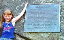 Katelyn next to Beacon Rock and plaque
